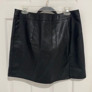 Black leather mini skirt